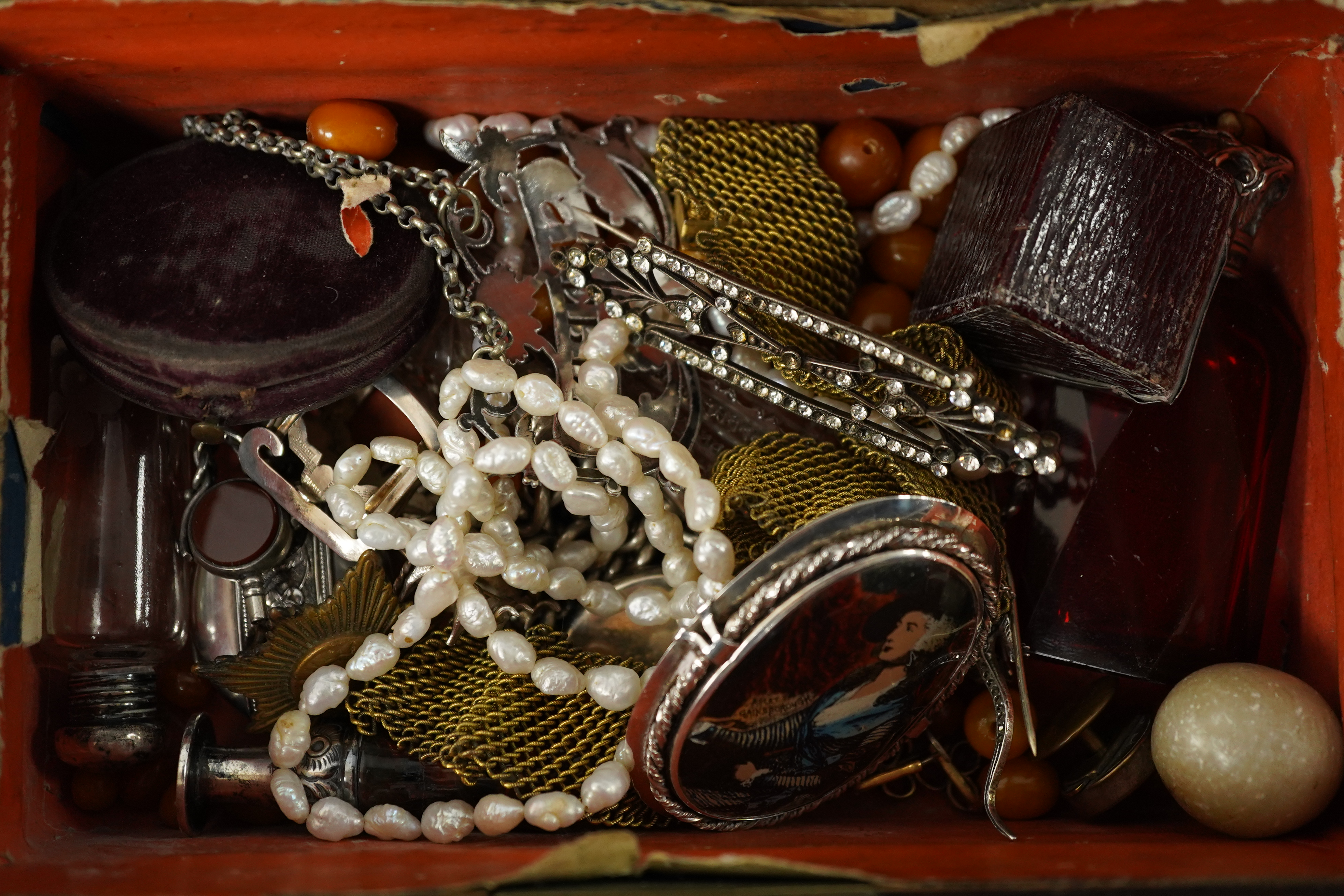 A small collection of assorted silver, white metal and jewellery including an Albert, four mounted glass scent bottles including Mordan & Co (a.f.), a hand bag mirror, a mounted desk seal, a plated wine label, a Portugue
